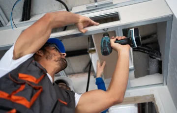 low-angle-people-working-with-drill low-angle-people-working-with-drill
